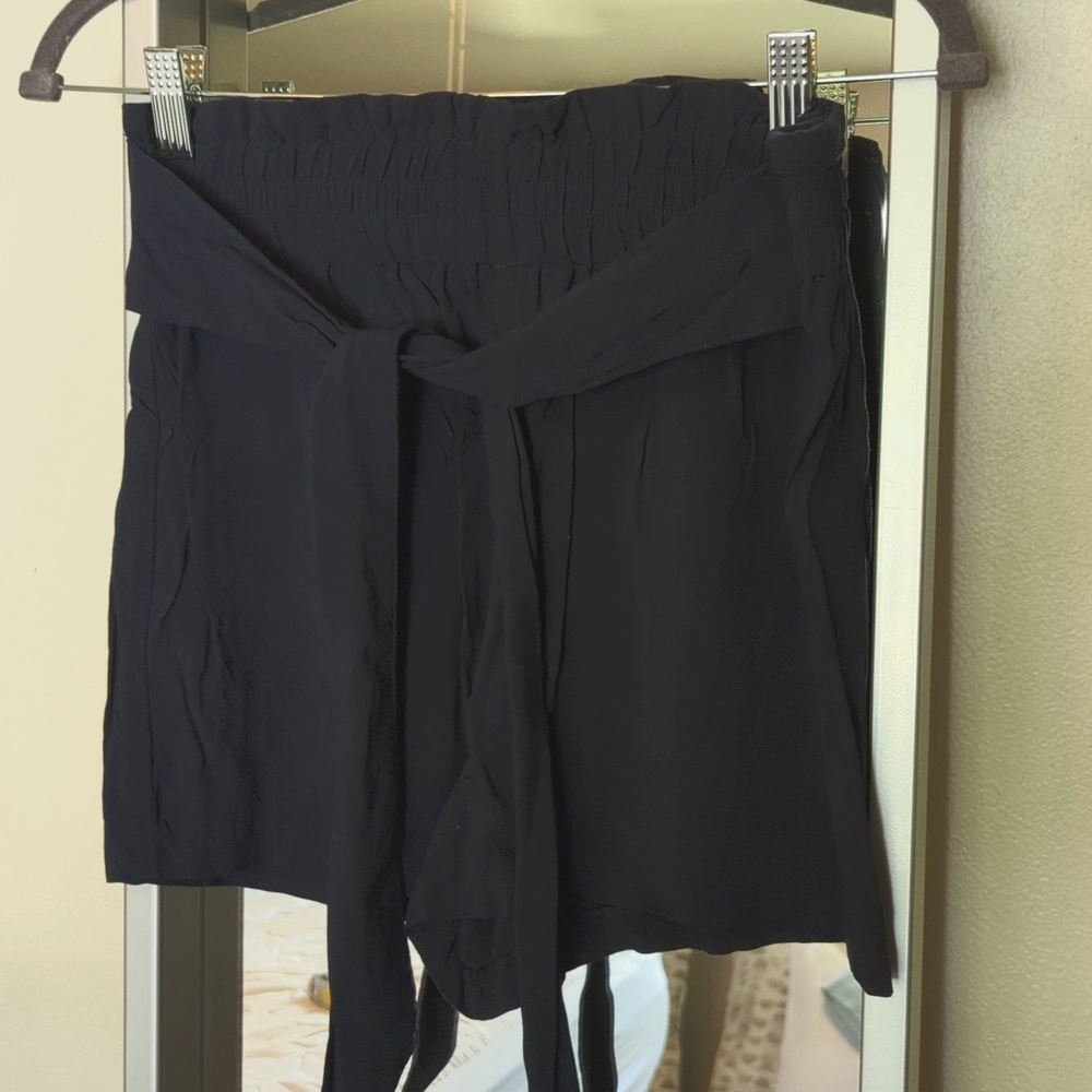 Navy blue shorts.